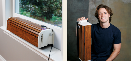 SWERV window ERV installed in a window next to founder Austin Riesenberger holding a SWERV unit