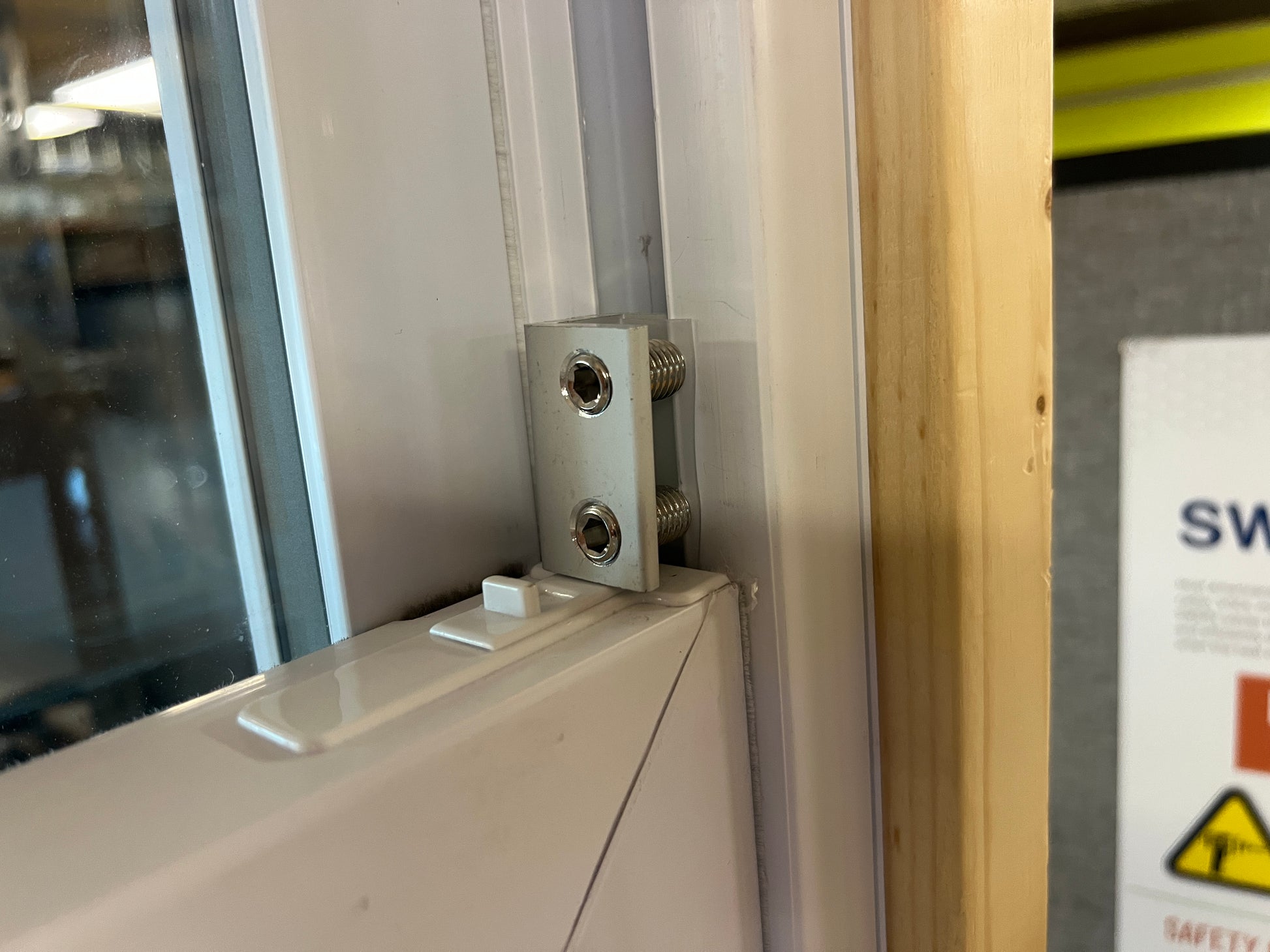 Metal window lock on a double hung sliding window in SWERVs lab