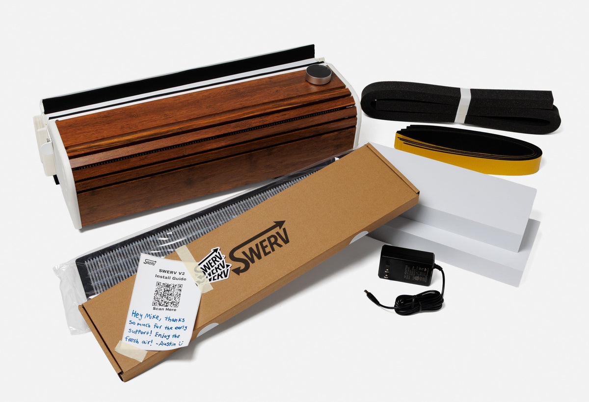 SWERV Window ERV unit and accessories unboxed with plain white background